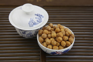 낮은 - 뚱뚱한 Wasabi는 Chickpeas 식사, 사각사각한 구워진 Chickpeas 단단한 짜임새를 불에 구웠습니다